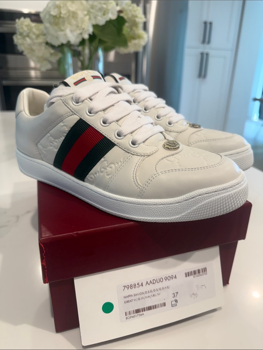Gucci White Leather Low-Top Sneakers with Green and Red Web Stripe